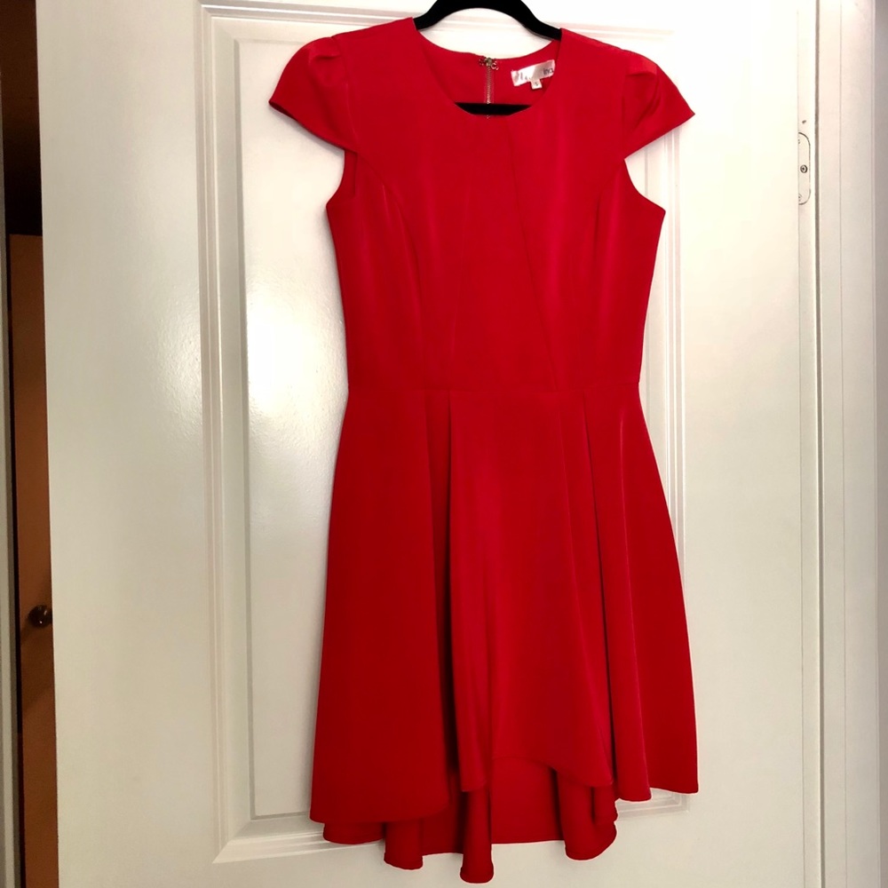 Fit and flare curved hem dress